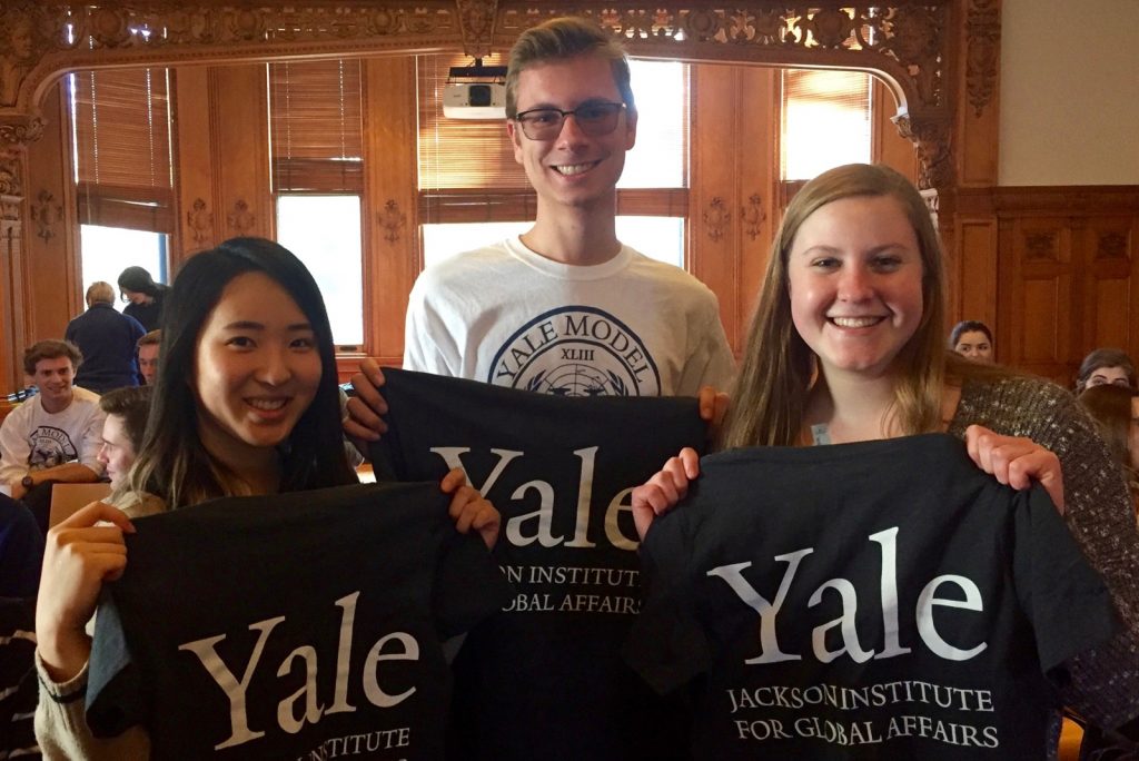 Jackson undergrads pose with their t-shirts at sophomore orientation (Genna Abele, Yoojin Han, and Alex Martinouk)